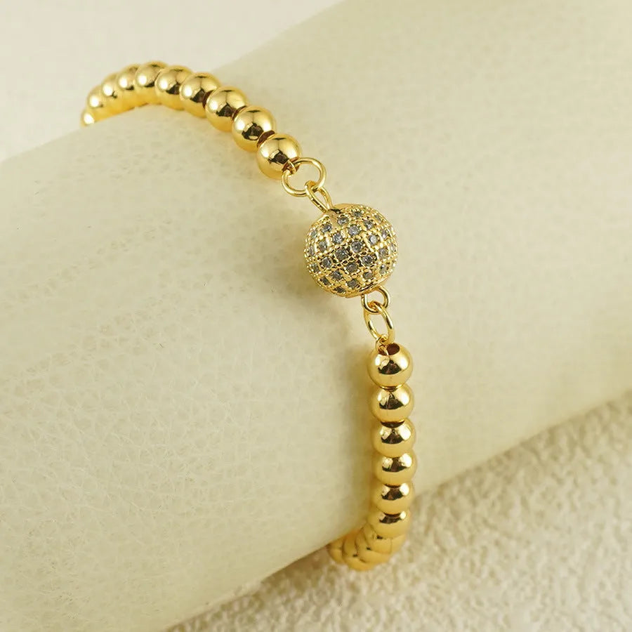 Copper bracelet with zircon beads and heart clasp in Arabic style design