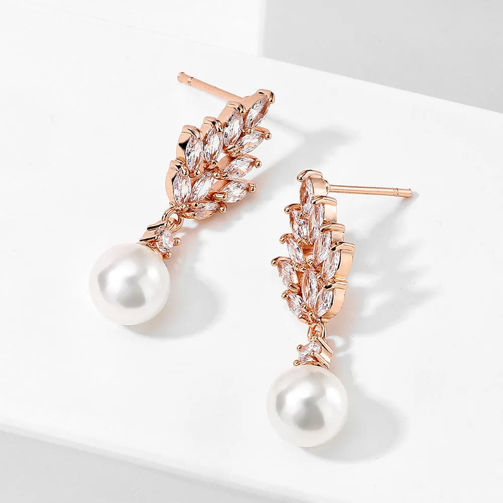 Geometric flower design women's earrings with pearl and micro-inlaid zircon stones in gold plating
