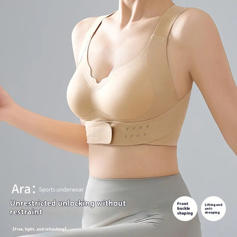 Women's front clasp sports bra with cross back design for yoga and exercise
