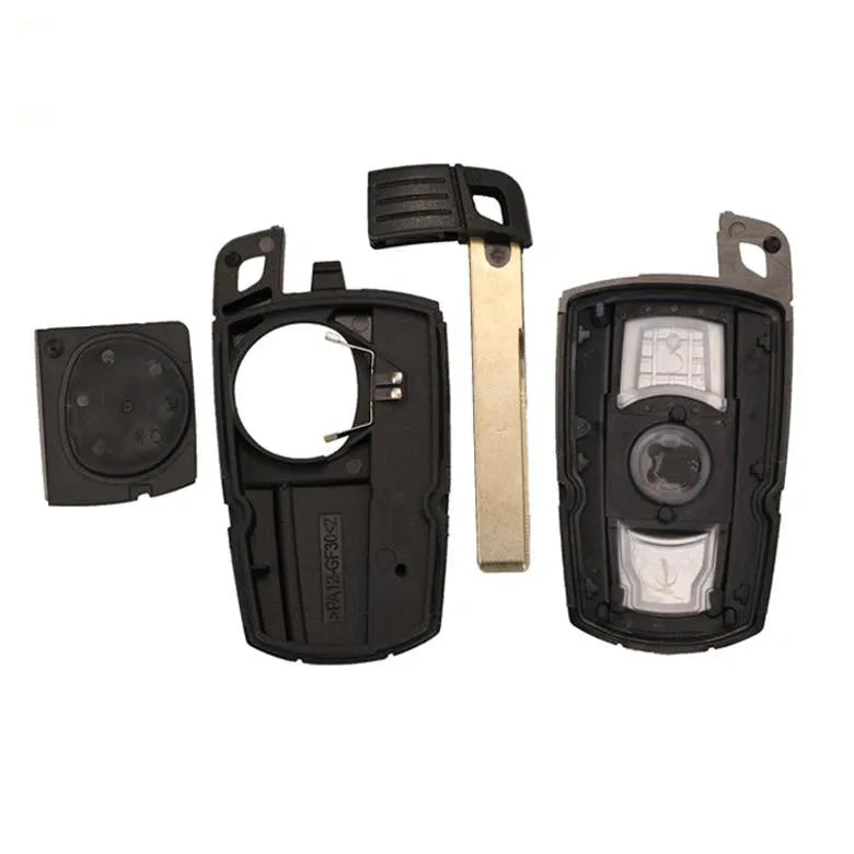 BMW CAS3 semi-intelligent remote car key fob with three buttons, metal and plastic construction.