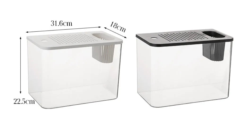 Medium black plastic betta fish tank with cover on a desktop