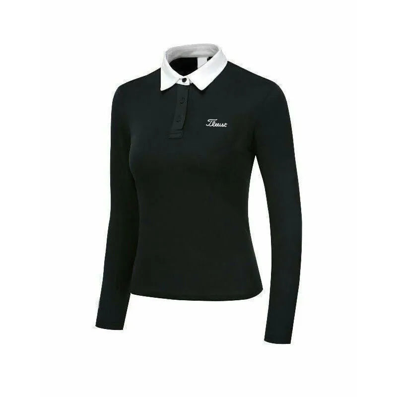 Women's slim-fit long sleeve polyester golf top in black on a hanger.