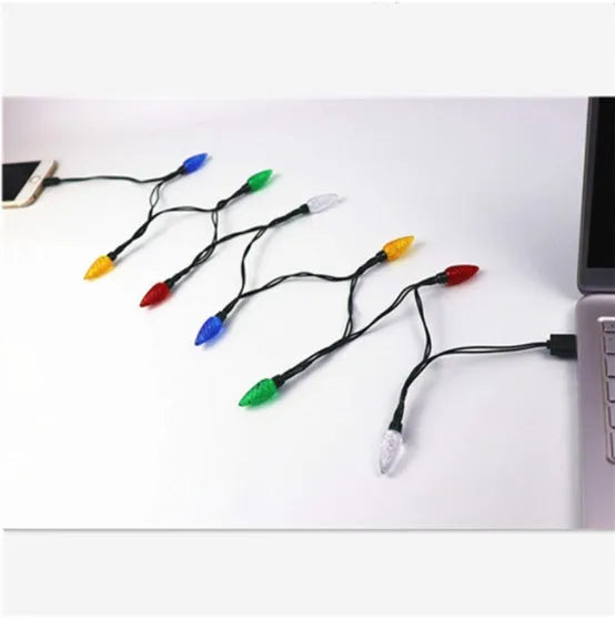 Green USB charging cable with 10 small LED lights illuminated along its length for festive decoration.