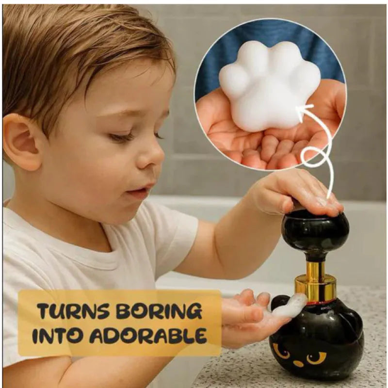 Black cartoon cat shaped soap extrusion dispenser measuring 10 by 18 centimetres