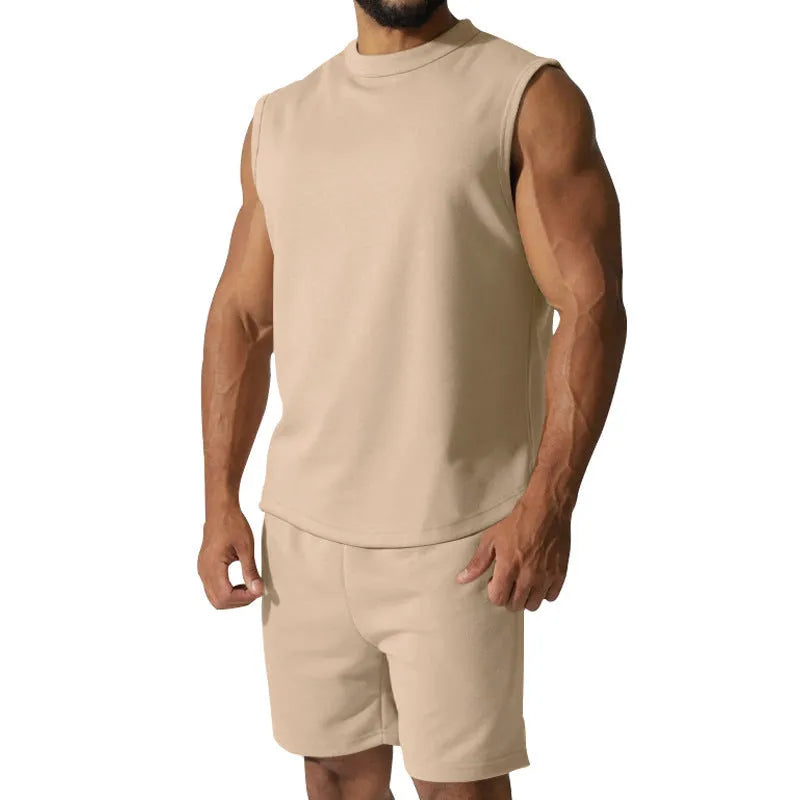 Men's sleeveless cotton blend sports top and matching shorts in solid colour options