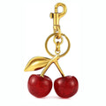 Red zinc alloy cherry-shaped keychain pendant with three-dimensional design