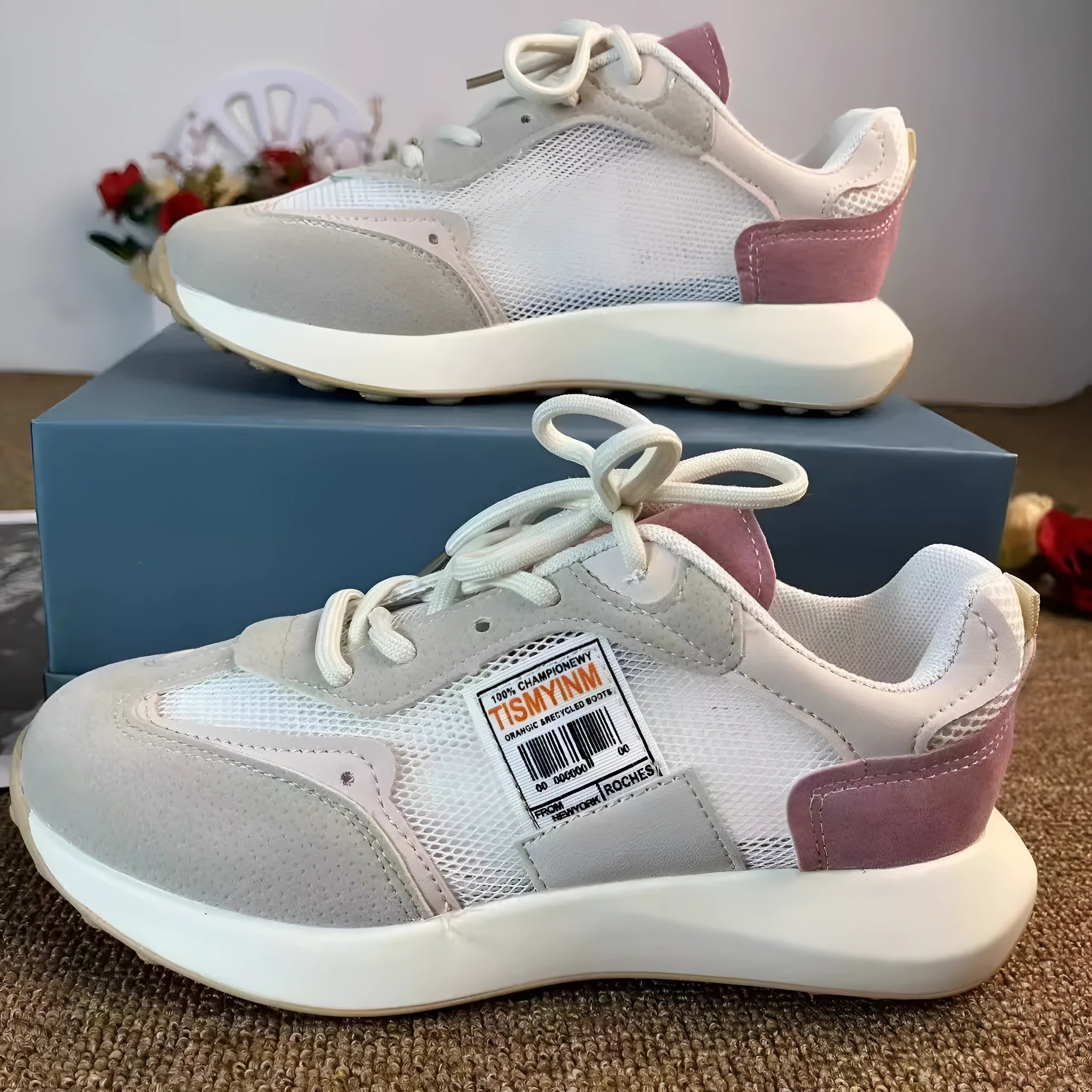 Women's grey and pink retro low-top sneaker with round toe and rubber sole