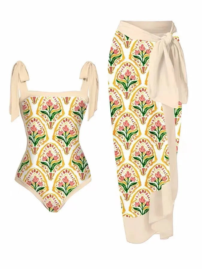 Women's printed floral two-piece swimsuit with a matching chiffon hip skirt.