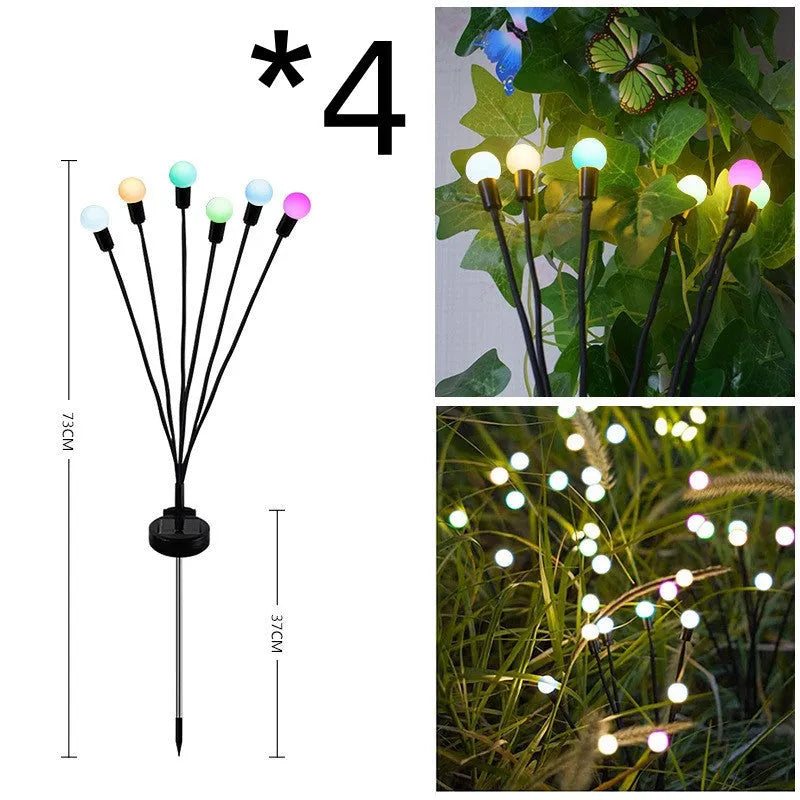 Solar-powered LED ground spike garden light with multiple heads and stainless steel soil plug.
