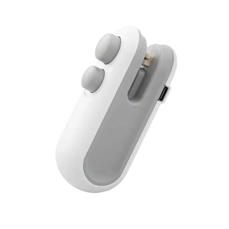 Handheld bag heat sealer in white and blue with USB charging port and cutter blade