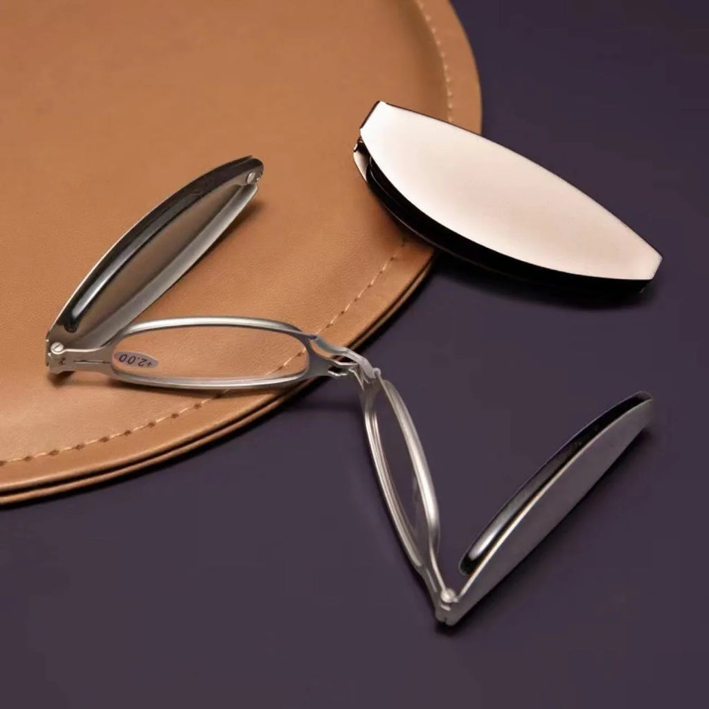 Folding pocket presbyopic glasses in black retro frame with ring detailing