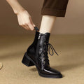 Women's black pointed-toe short tube boots with 13cm sock length and artificial PU upper
