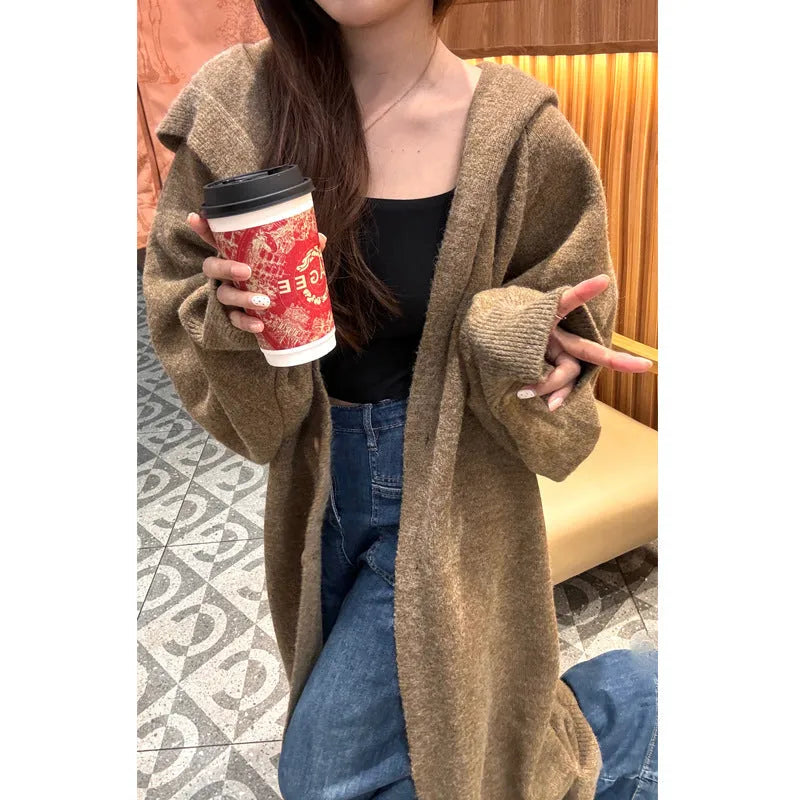 Korean style long hooded knitted cardigan coat for women in a loose free size.