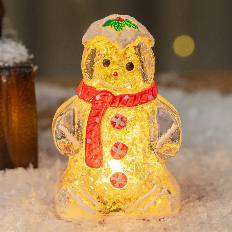 Set of four glowing Christmas gingerbread man and snowman ornaments with different coloured scarves on a festive background.