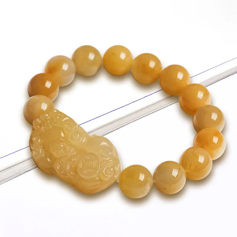 Carved Jinsi Jade money bracelet in golden thread colour showing large and small size options.