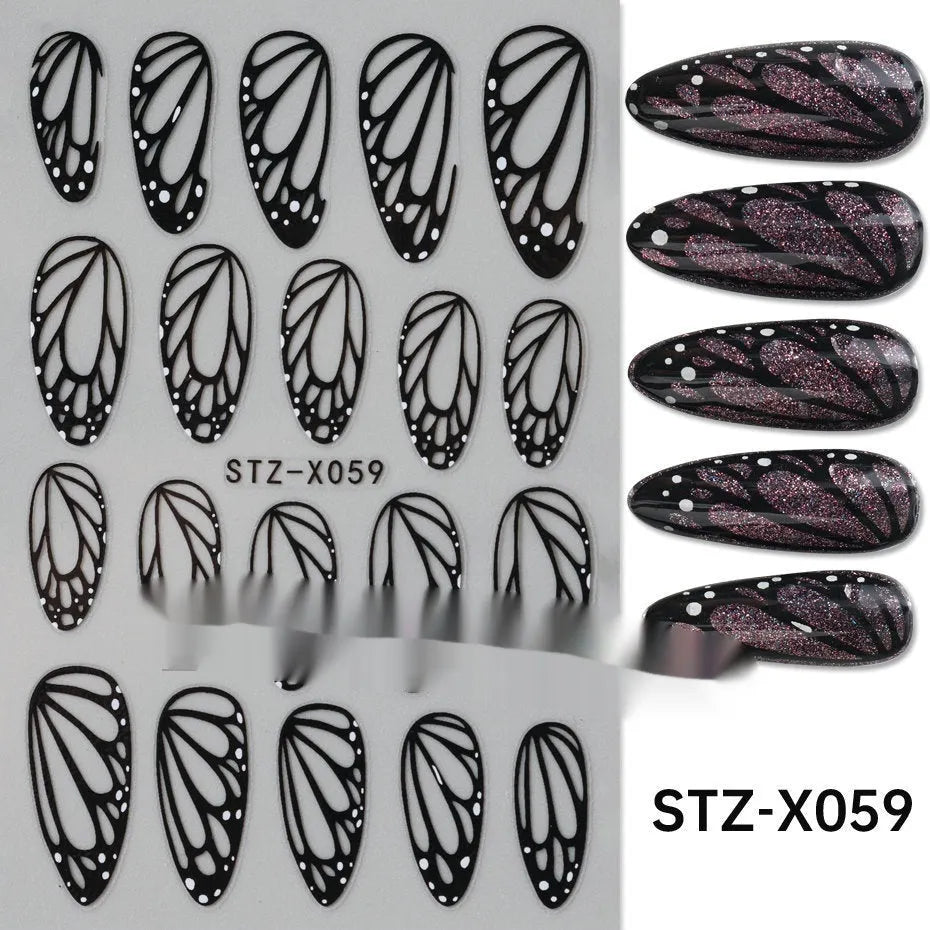 Sheet of black and silver love heart pattern nail art stickers with a plastic nail patch.