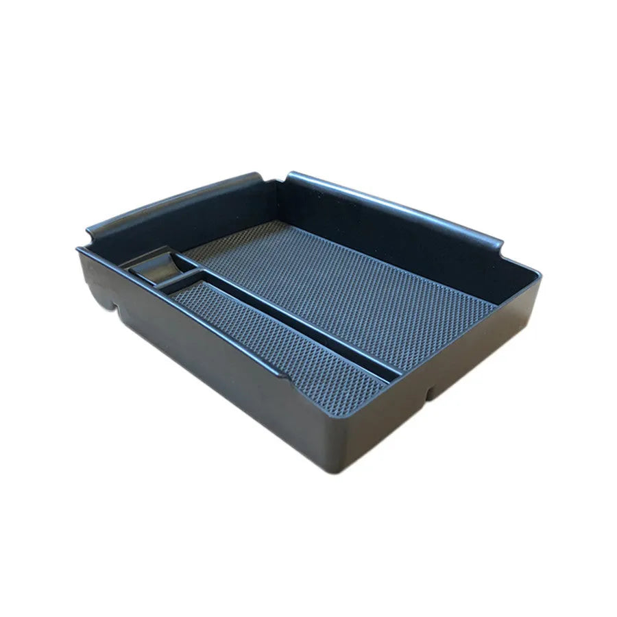Black wireless charging storage box with Qi compatibility and base support for device organisation
