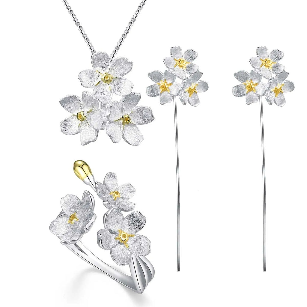 Myosotis Sylvatica sterling silver floral pendant in pastoral style, showing gold and silver colour options.