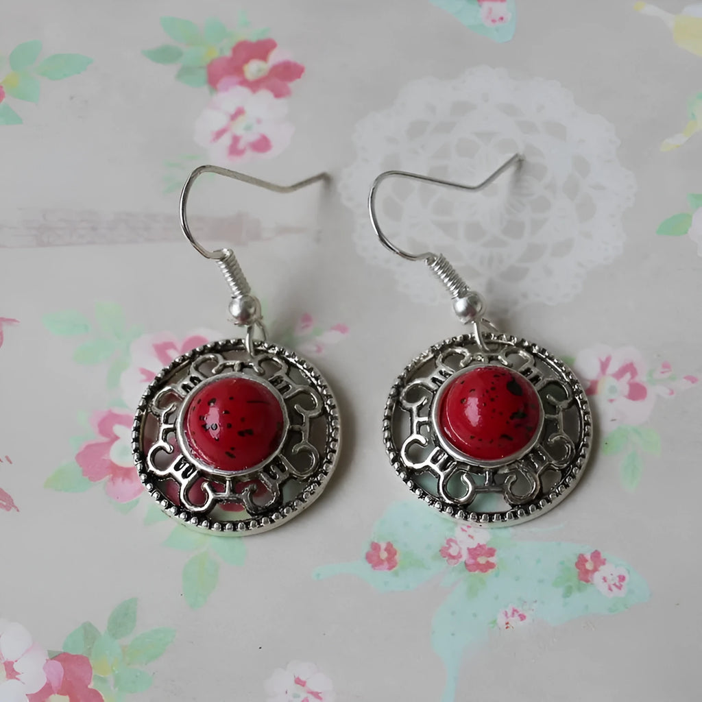 Geometric turquoise flower disk earrings in Miao silver with ethnic patterns