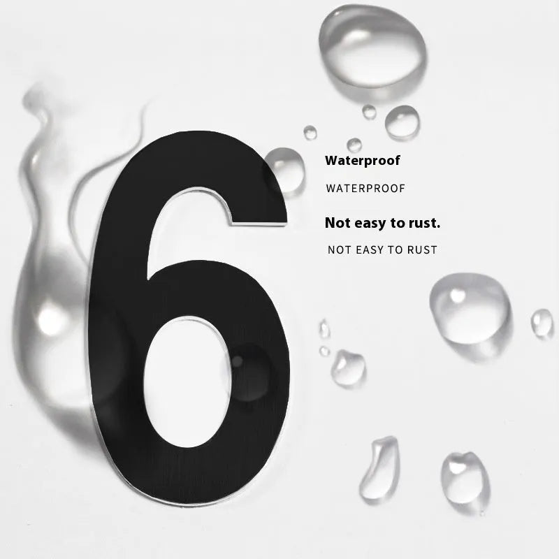 Black stainless steel adhesive house number showing 7.5cm character on backing