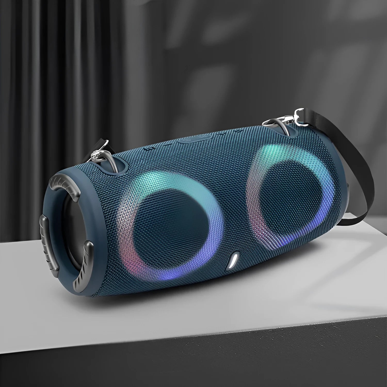 War Drum portable Bluetooth speaker with RGB lights in camouflage colour with carrying strap.