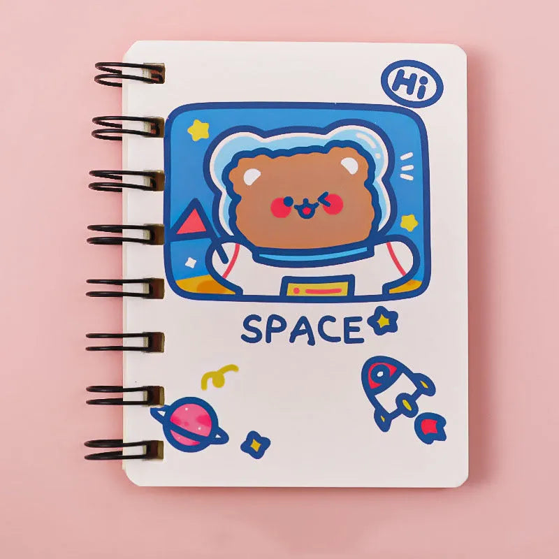 Astronaut themed flip-over pocket notebook showing 10.5cm by 8cm compact size