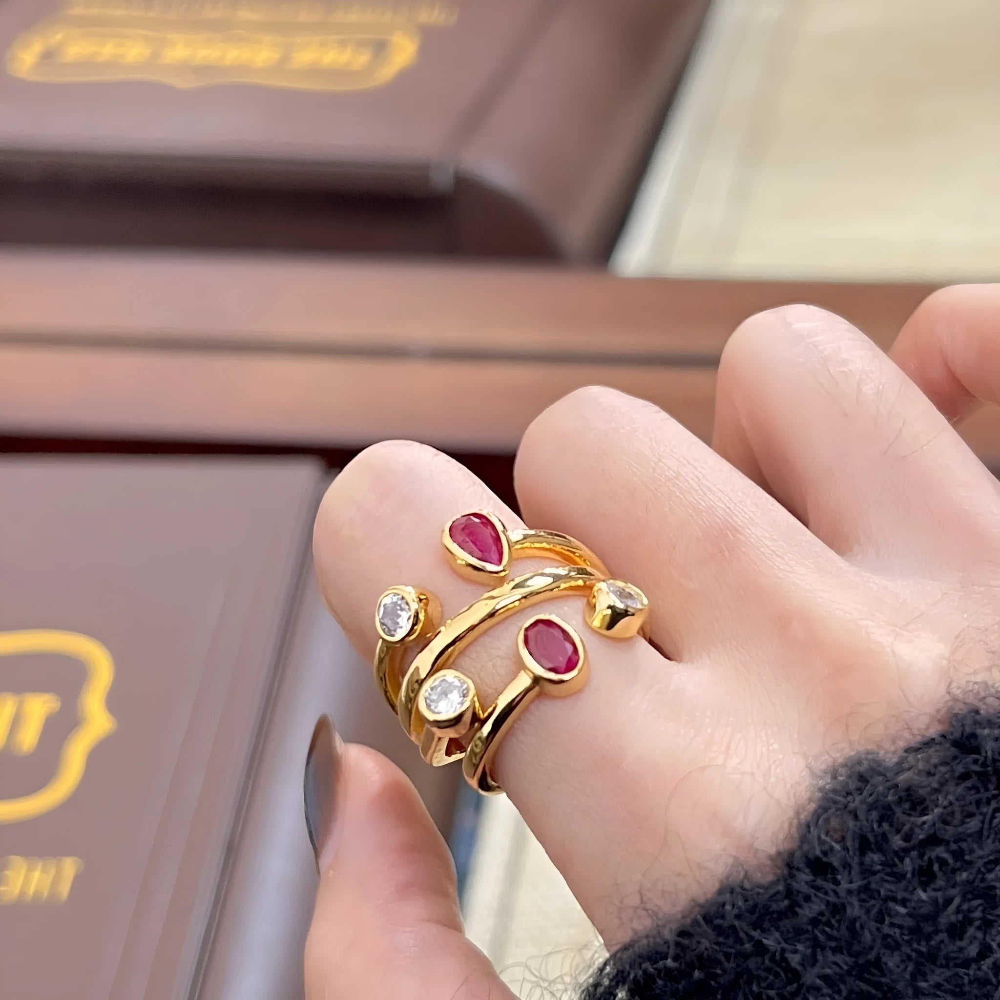 Irregular cross two-colour diamond ring with double-headed geometric design