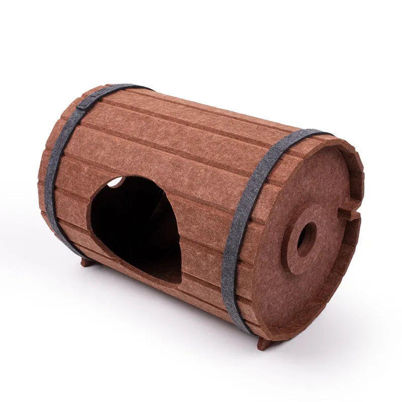 DIY wine barrel shaped cat bed made from three brown felt panels with binding straps