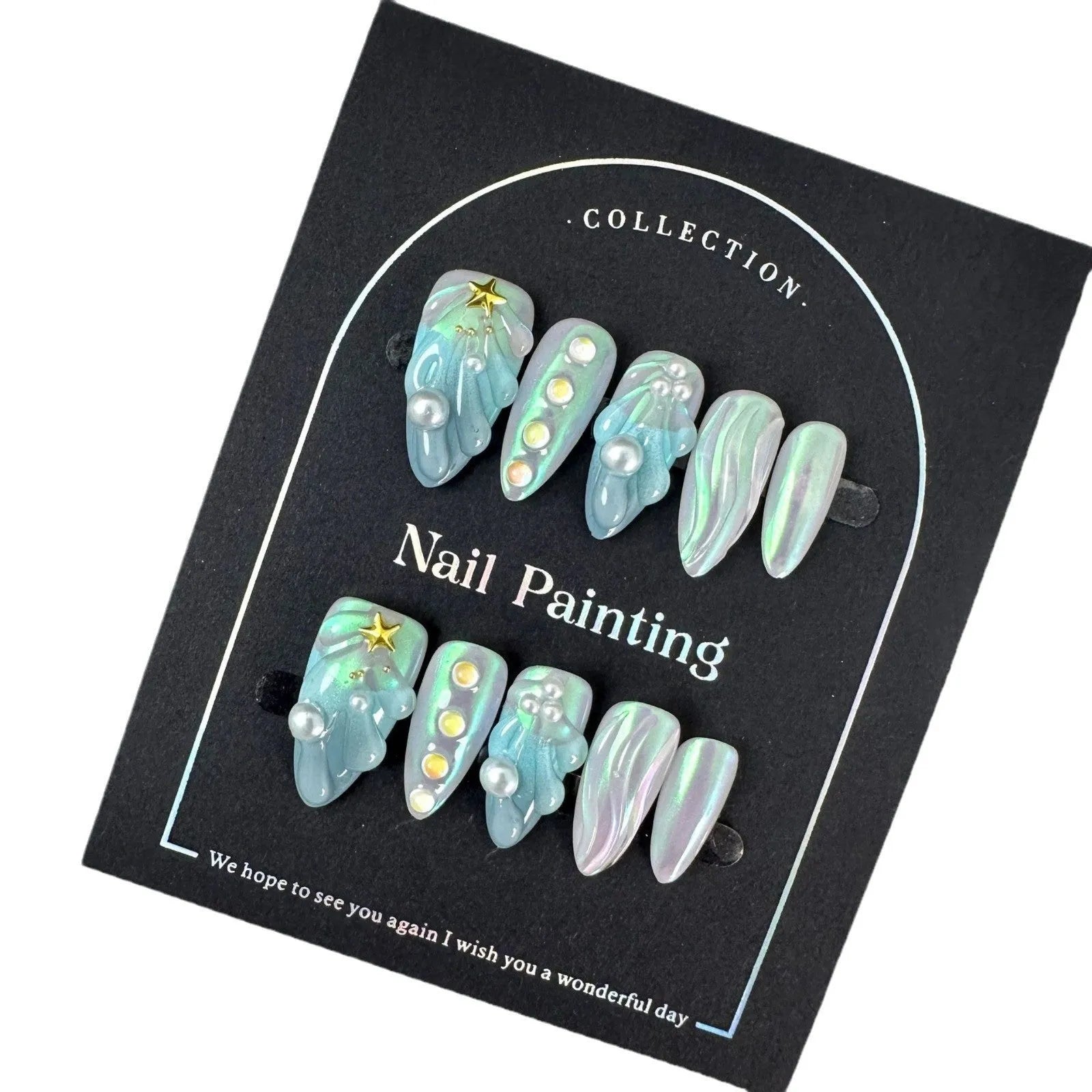 Blue plastic artificial nail tips laid out showing sizes XS S M L