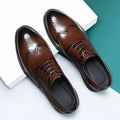 Men's black and brown brogue business shoes with classic perforated toe cap detailing