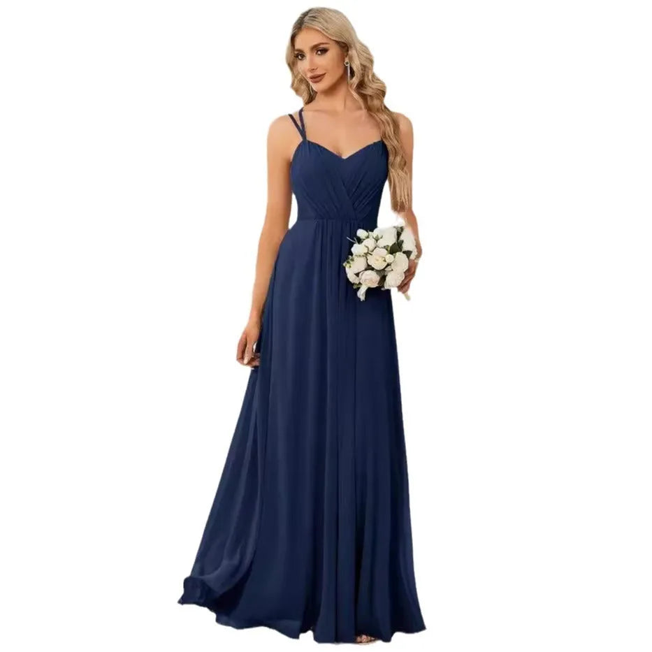 Women's sleeveless long A-line pleated dress in solid colour polyester fabric