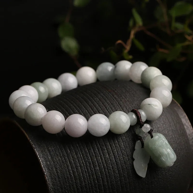 Natural jade bracelet with geometric hanging design and Buddhist elements including Maitreya Buddha motif