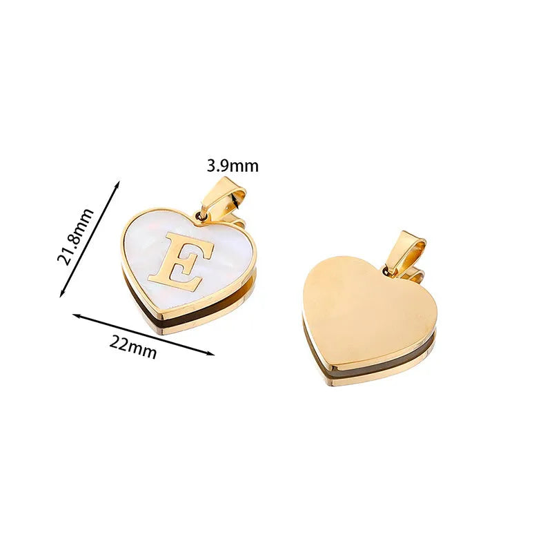 Gold-plated heart necklace with white shell pendant personalised with a letter, on an adjustable chain.