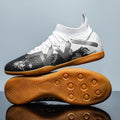 Adult football boots with replaceable studs in black and yellow colour with low-top mesh design