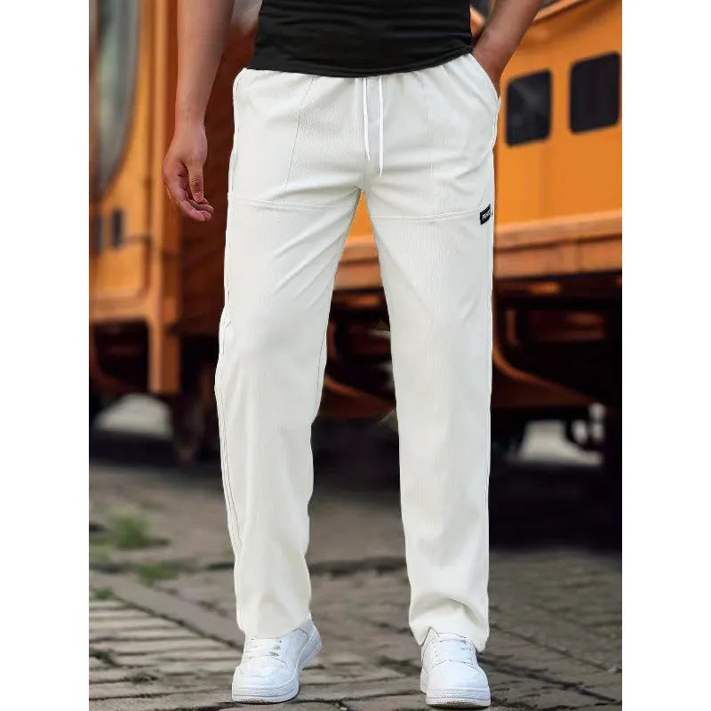 Men's polyester trousers for spring and autumn in light grey, available in sizes S to XXXL.