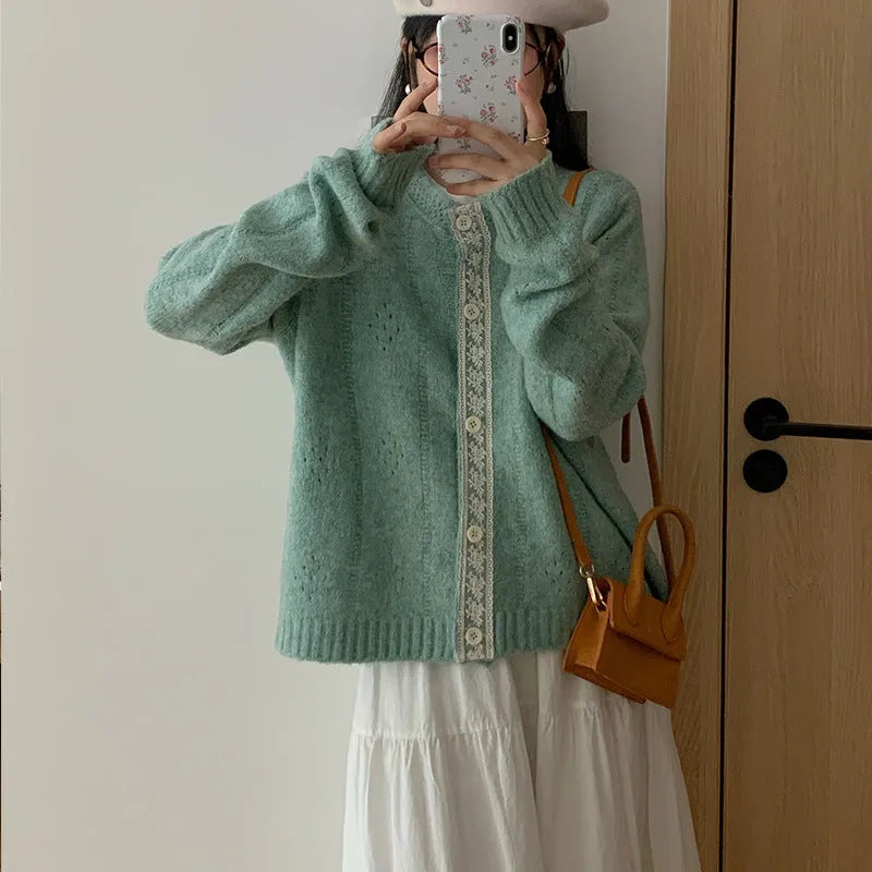 Artistic retro loose-fit sweater coat in viscose fibre, shown in apricot colour.