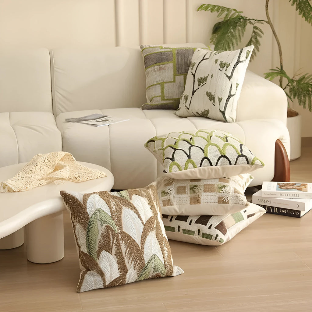 Jacquard floral pattern cushion cover in a retro colour, 45cm square, on a sofa.