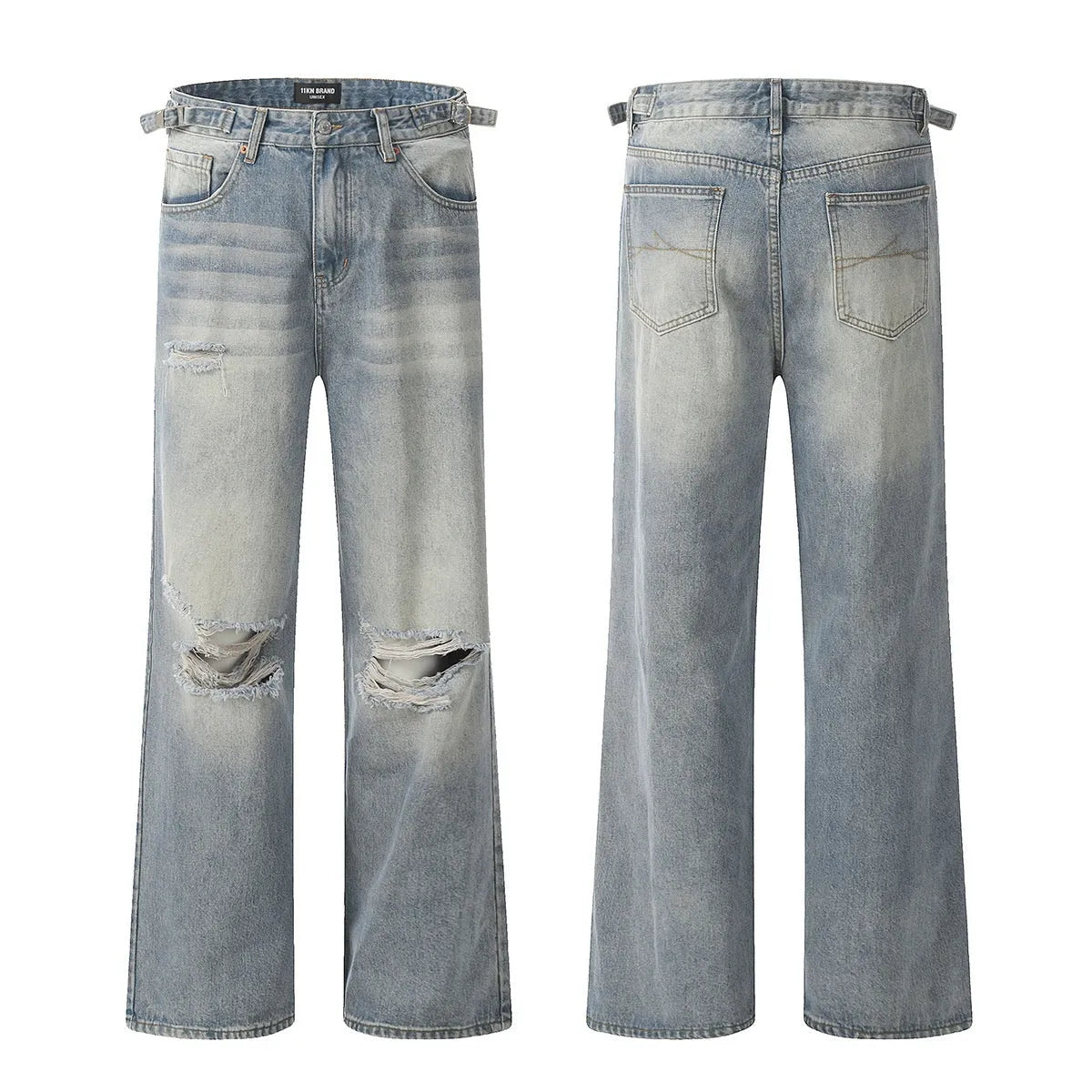 Man wearing blue straight-leg jeans with ripped detailing and an adjustable waistband.