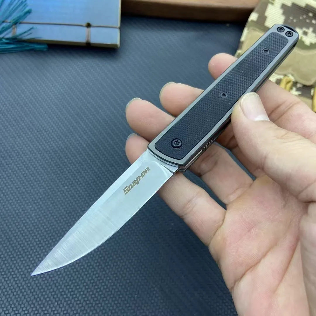Folding fruit knife with stainless steel blade shown open, demonstrating 17cm total length