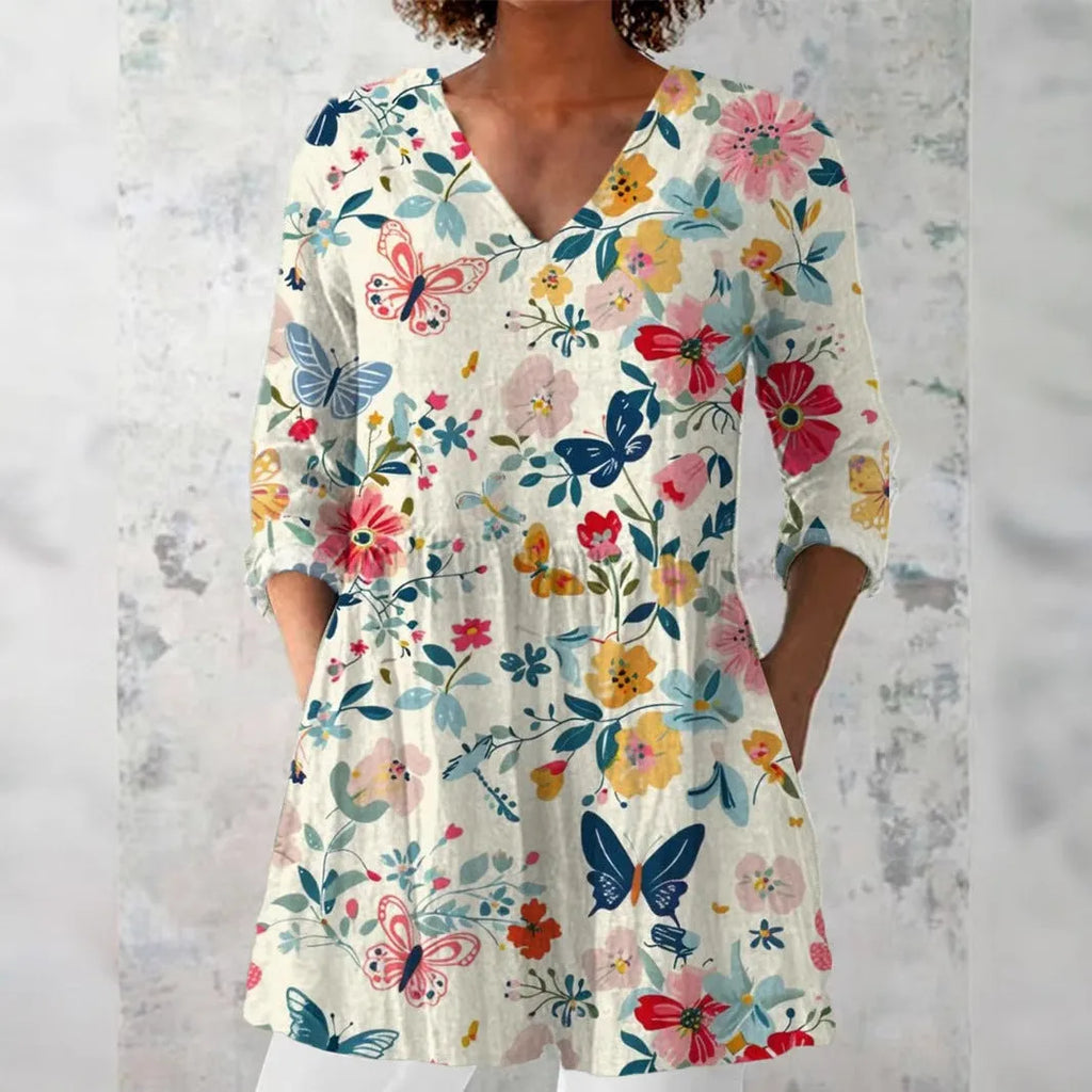 Women's retro slim fit printed long-sleeved polyester top on a hanger, showing digital print design.