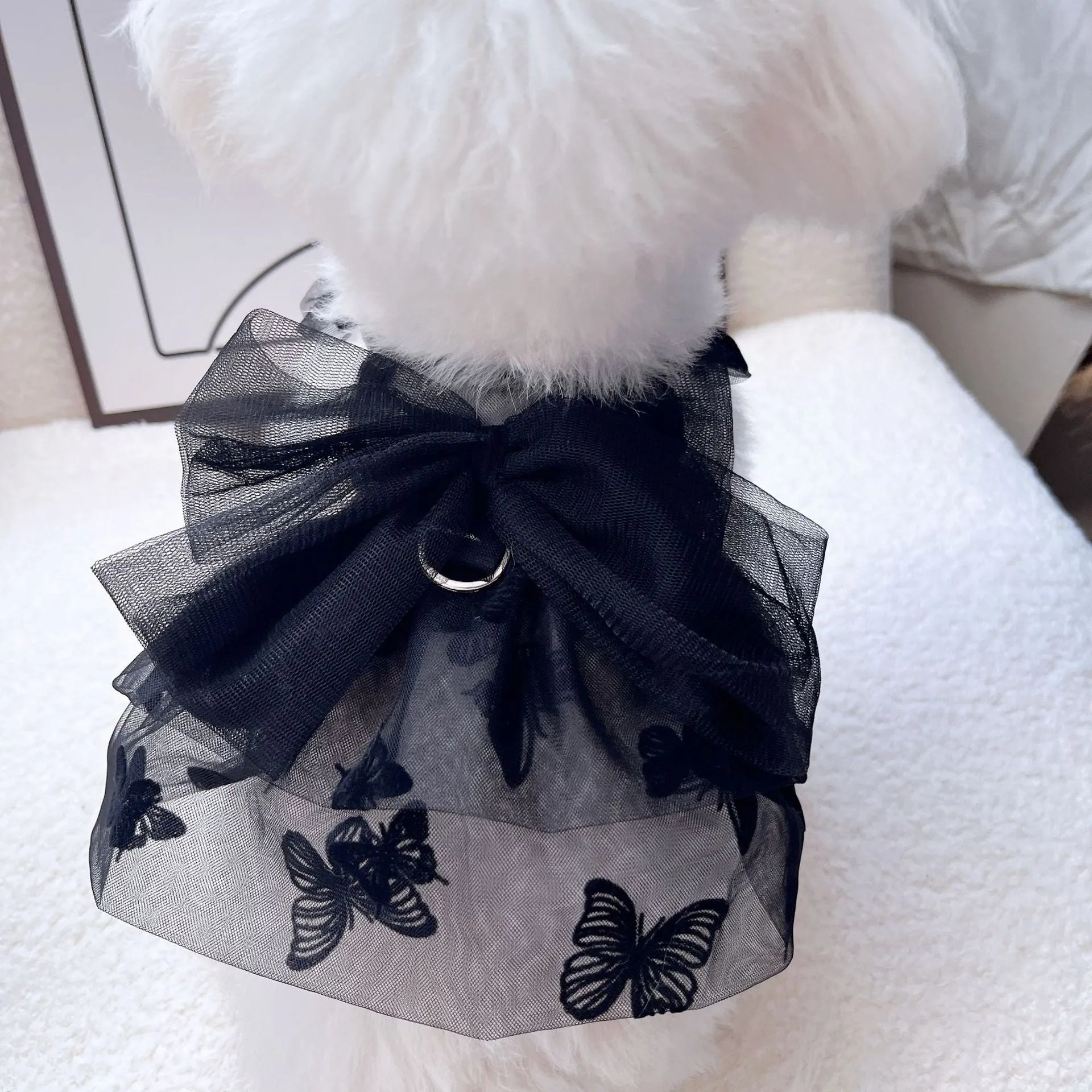 Black polyester princess tulle skirt for small dogs and cats with size chart showing chest and back measurements