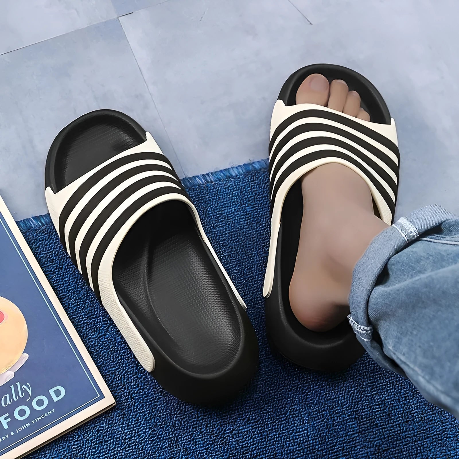 Men's casual slippers with a PVC upper and EVA sole in a two-tone colour option on a plain background.