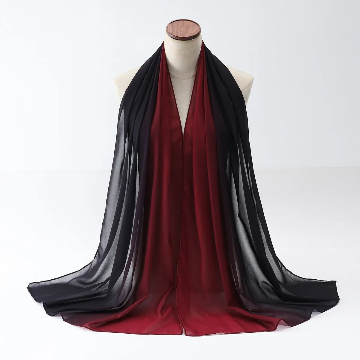 Long lightweight chiffon summer scarf for women draped to show its 175cm length and soft fabric.