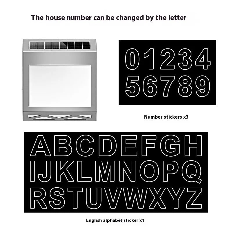 Black solar-powered doorplate light with LED illumination for house numbers measuring 180x50x200mm