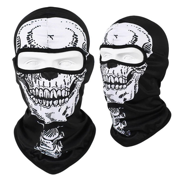 Breathable Bakool silk motorcycle skull mask in a graphic design, laid flat showing its 36cm by 29cm size.