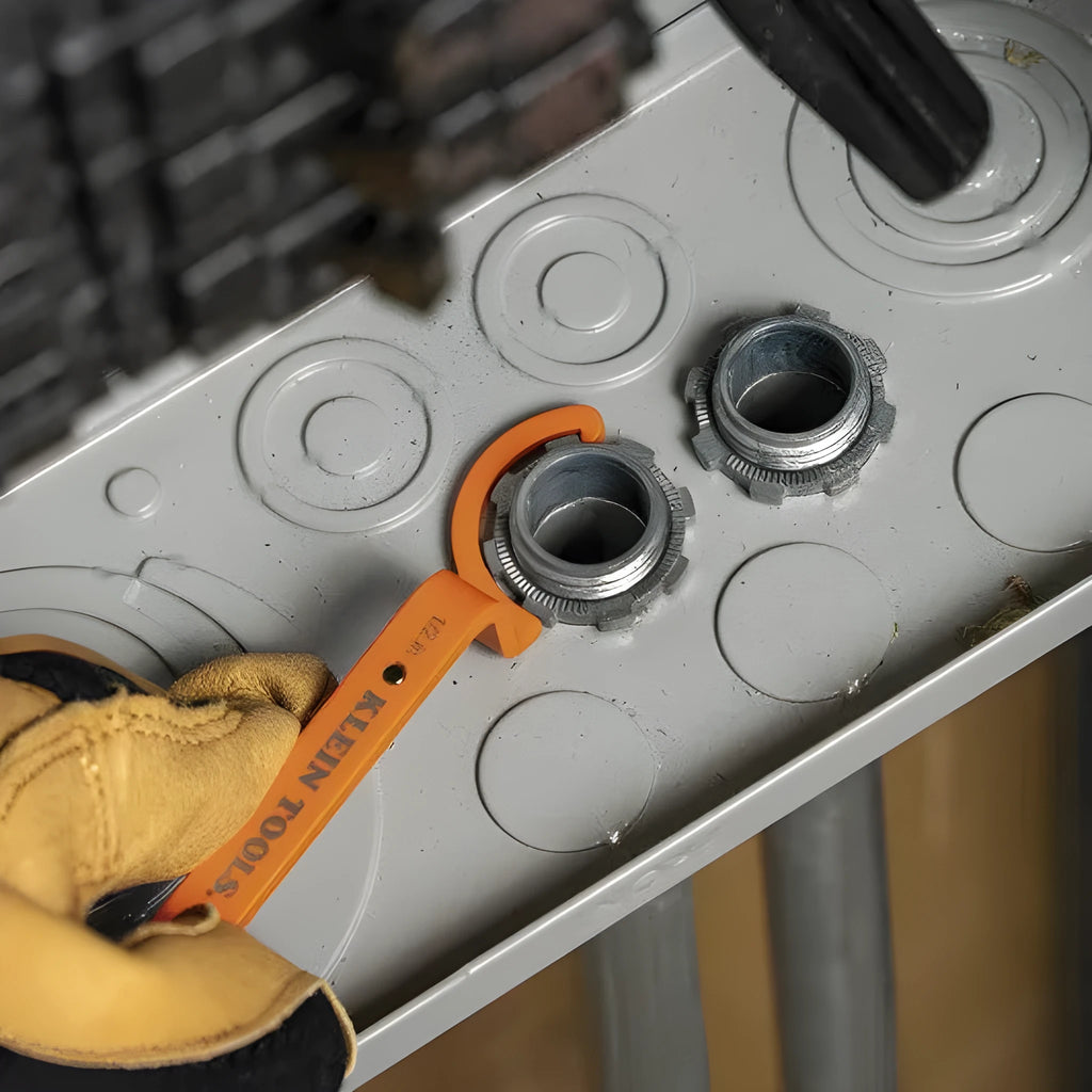 Three-piece magnetic suction wrench set in orange, grey, and black with catheter locking mechanisms