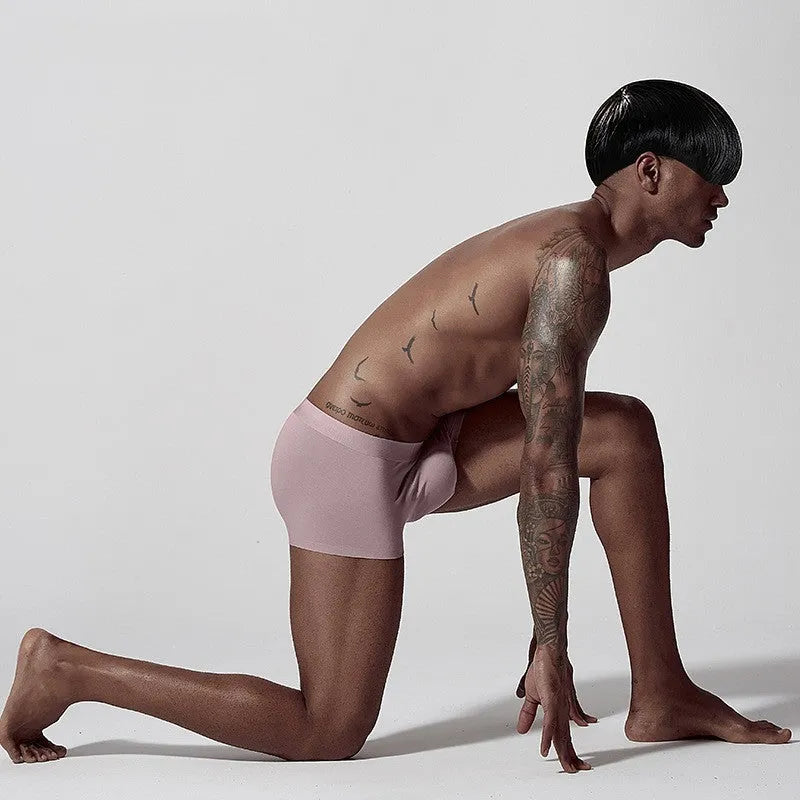 Men's modal seamless underwear in green colour showing mid waist design and solid pattern