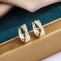 Geometric shape earrings with zircon detail in 14K yellow gold-tone finish