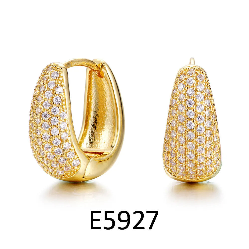 Gold-plated heart-shaped clip earrings with clear zircon stones