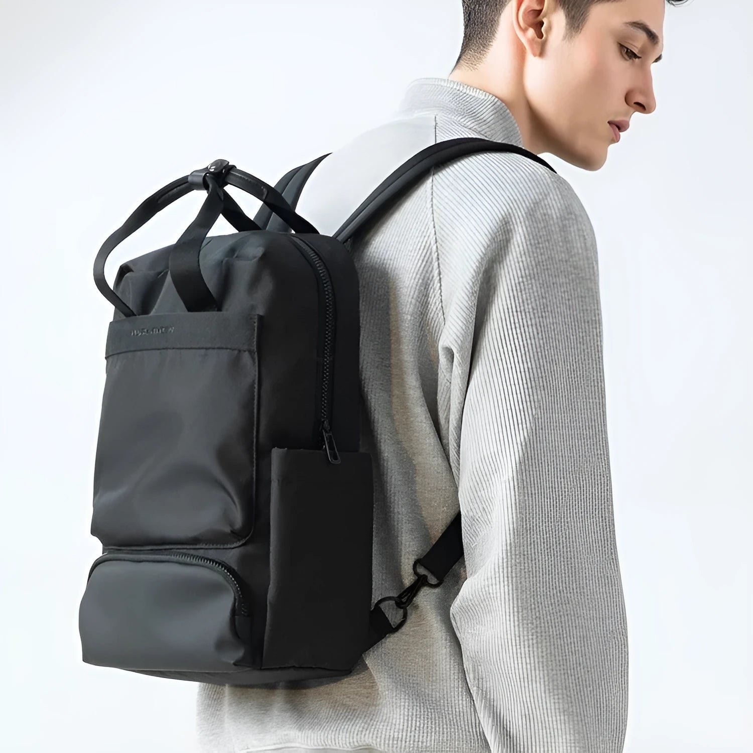 Black Oxford cloth computer backpack with 20-35L capacity for laptops and tablets